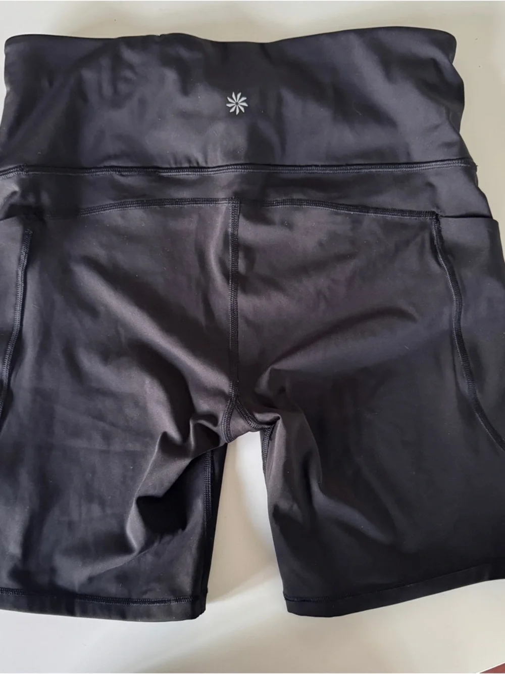 Athleta Ultimate Stash Black High-Rise Bike Shorts with Side Pockets - Picture 2 of 4